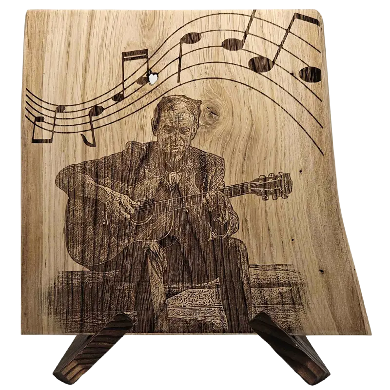 gravure sur une planche en chene d'un guitariste